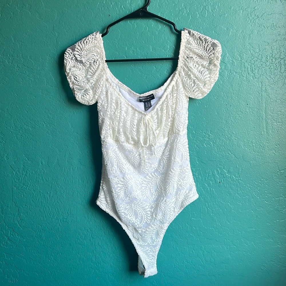 White lace body suit